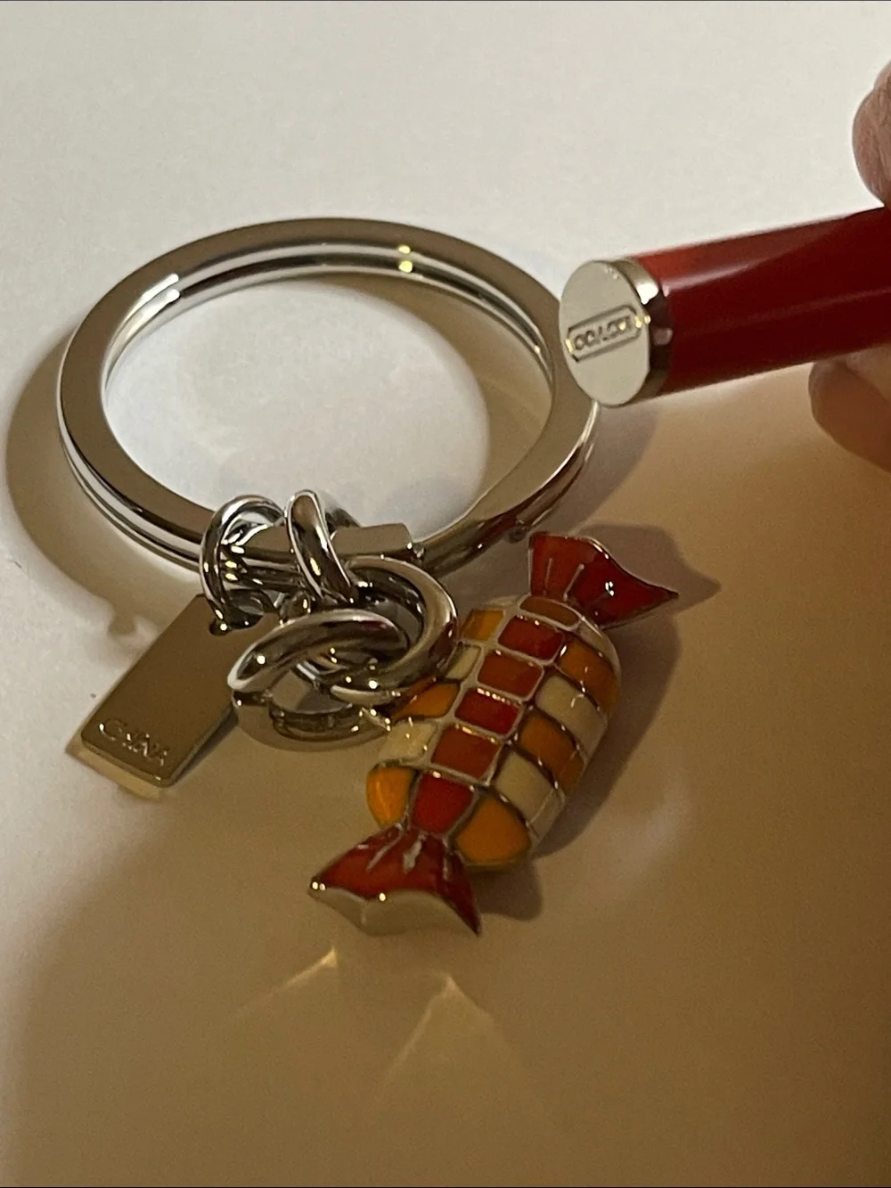 Coach Orange & White Candy Charm Keychain and Coach Pen